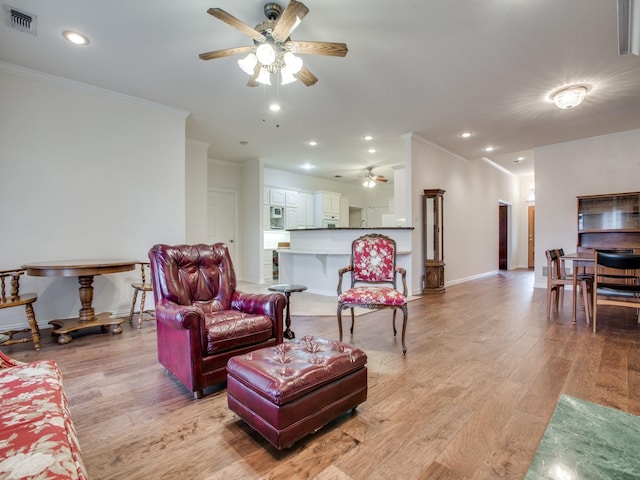 503 Hillcrest Ln, Krum, TX 76249 - living area with a ceiling fan, ornamental molding, light wood finished floors, baseboards, and recessed lighting