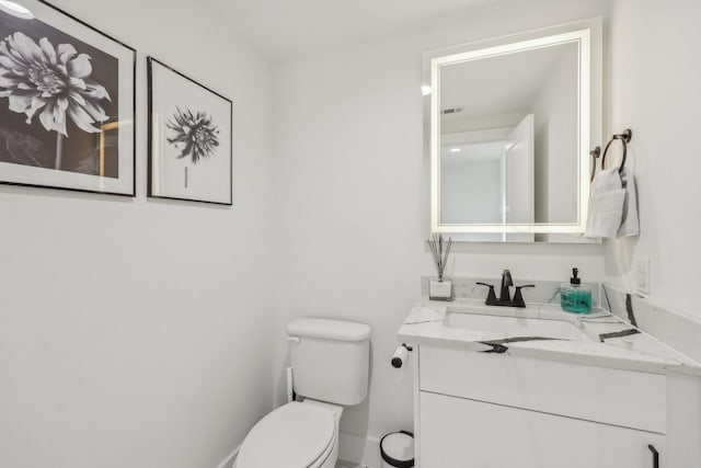 2102 N Prairie Ave Unit 105, Dallas, TX 75204 - bathroom with toilet and vanity