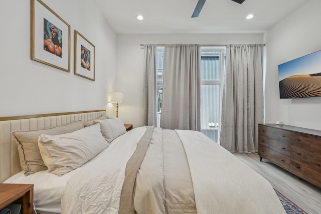 2102 N Prairie Ave Unit 105, Dallas, TX 75204 - bedroom featuring light wood finished floors, recessed lighting, and ceiling fan