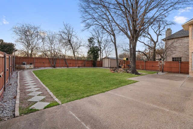 1307 Hillary Ln, Arlington, TX 76012 - view of yard with a storage unit, a patio area, and an outdoor structure