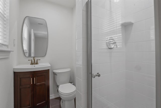 1201 Crockett St, Garland, TX 75040 - full bathroom with a stall shower, vanity, and toilet