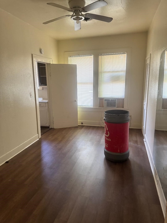 605 Merrick St, Shreveport, LA 71104 - unfurnished dining area with wood finished floors, ceiling fan, cooling unit, and baseboards