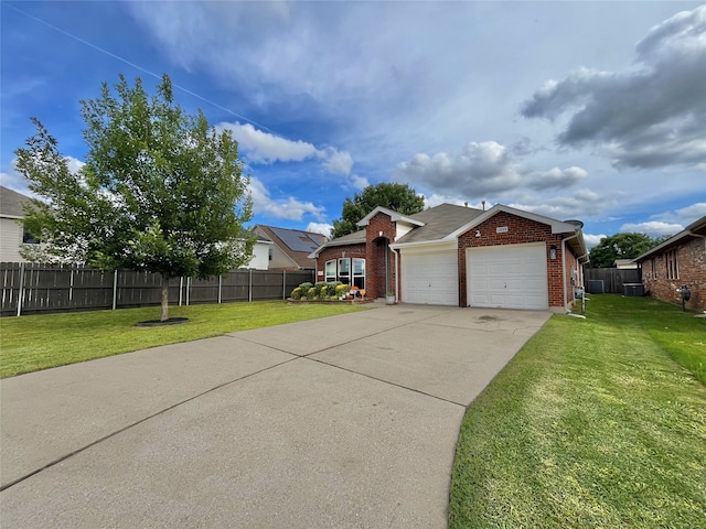 5805 Bridal Trl, Fort Worth, TX 76179 - view of front of property with brick siding, a garage, concrete driveway, and central AC