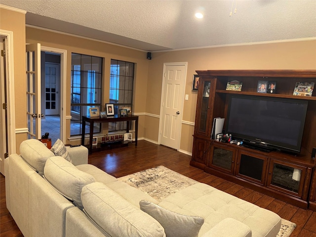 4809 Westhaven Rd, Arlington, TX 76017 - living area featuring dark wood-style floors, a textured ceiling, ornamental molding, and baseboards