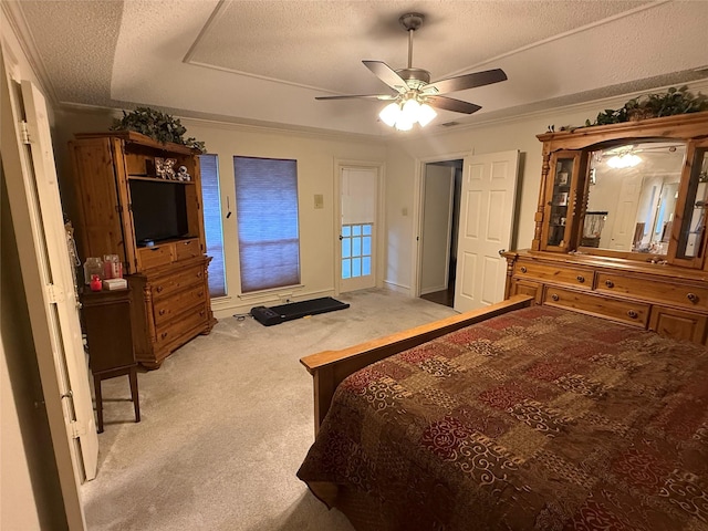 4809 Westhaven Rd, Arlington, TX 76017 - carpeted bedroom featuring a textured ceiling, crown molding, a ceiling fan, and a raised ceiling