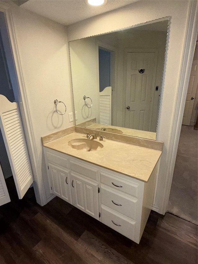 4809 Westhaven Rd, Arlington, TX 76017 - bathroom featuring wood finished floors and vanity