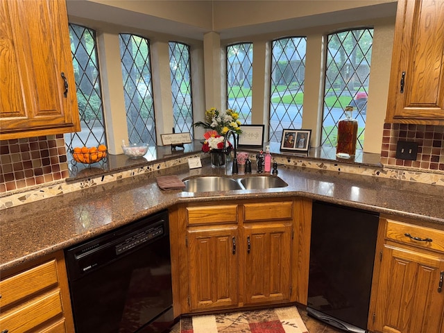 4809 Westhaven Rd, Arlington, TX 76017 - kitchen featuring dishwasher, a sink, brown cabinets, and tasteful backsplash