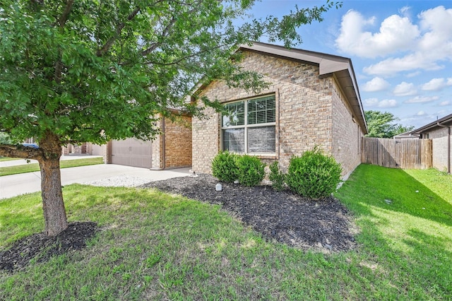 737 Walls Blvd, Crowley, TX 76036 - view of front of house featuring driveway, brick siding, and a garage