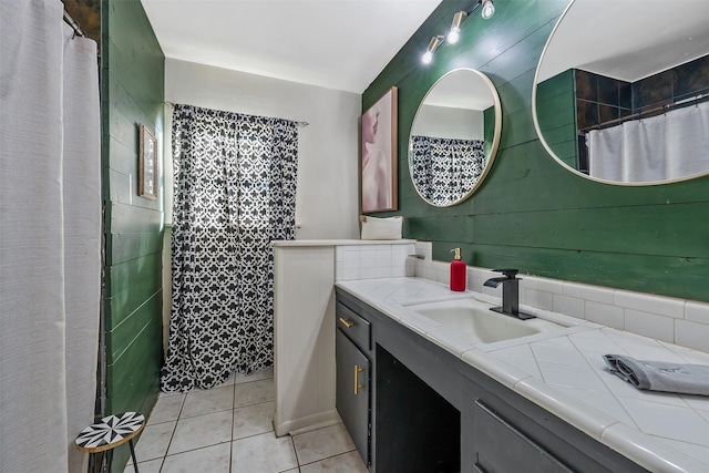 3020 Meadowlark, Tyler, TX 75701 - bathroom featuring tile patterned floors, vanity, and a shower with curtain