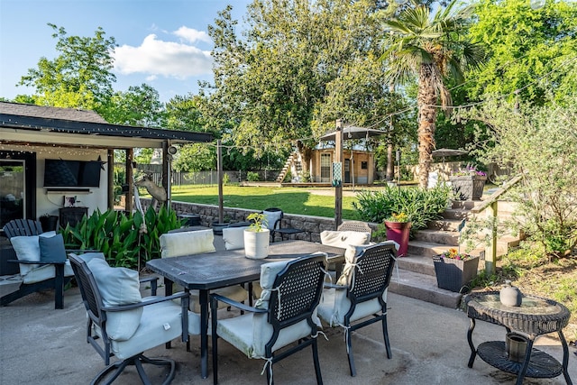 3020 Meadowlark, Tyler, TX 75701 - view of patio with an outdoor structure and outdoor dining space
