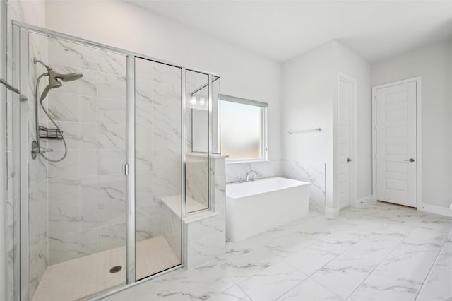 6322 Farndon Dr, Celina, TX 76227 - bathroom featuring a soaking tub, a marble finish shower, and marble look tiles