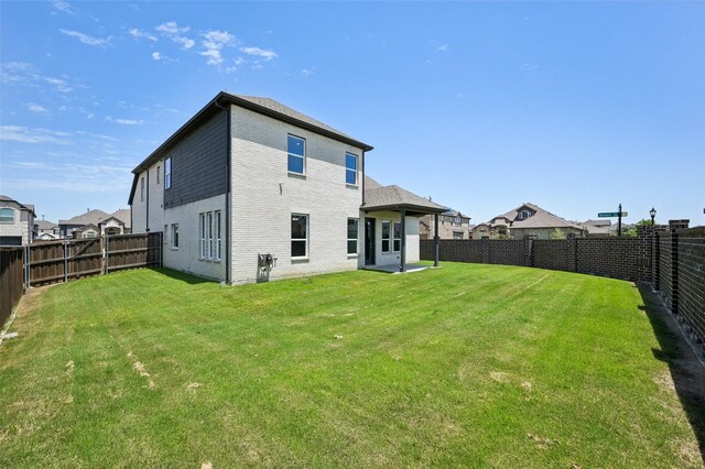 6322 Farndon Dr, Celina, TX 76227 - rear view of property with a fenced backyard and brick siding