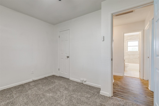 5241 E Berry St, Fort Worth, TX 76119 - unfurnished room featuring baseboards and carpet flooring
