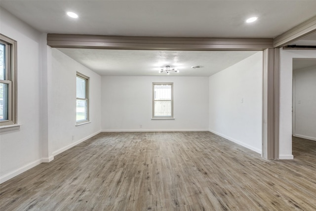 5241 E Berry St, Fort Worth, TX 76119 - spare room featuring wood finished floors, baseboards, and recessed lighting