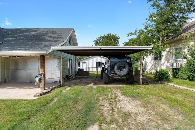 442 W Mccart St, Krum, TX 76249 - view of parking with driveway and a detached carport