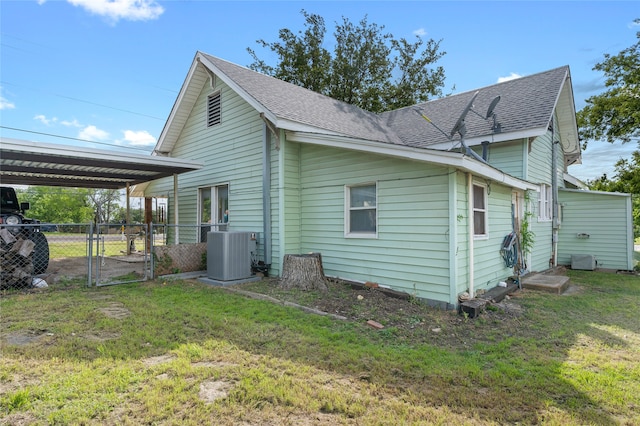 442 W Mccart St, Krum, TX 76249 - view of property exterior with central air condition unit, a gate, and a shingled roof