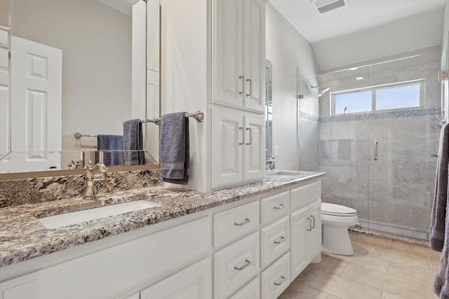 528 Layton Dr, Coppell, TX 75019 - bathroom with toilet, double vanity, a stall shower, and tile patterned floors