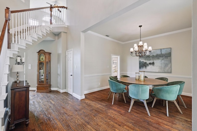 528 Layton Dr, Coppell, TX 75019 - dining room with a chandelier, wood finished floors, stairs, crown molding, and baseboards