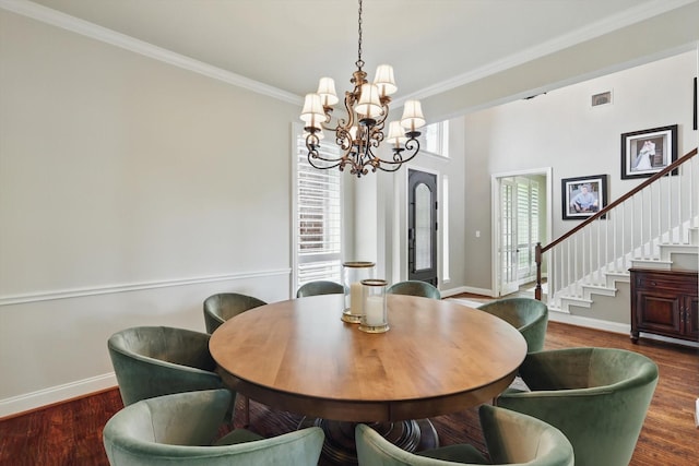 528 Layton Dr, Coppell, TX 75019 - dining room with baseboards, a chandelier, ornamental molding, stairway, and wood finished floors