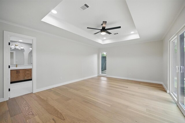 6407 Laurel Valley Rd, Dallas, TX 75248 - unfurnished bedroom featuring a raised ceiling, light wood finished floors, access to outside, recessed lighting, and crown molding