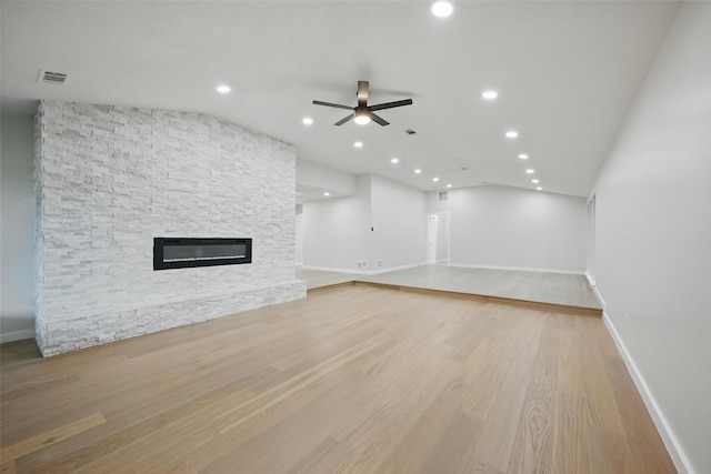 6407 Laurel Valley Rd, Dallas, TX 75248 - unfurnished living room featuring ceiling fan, recessed lighting, baseboards, a stone fireplace, and light wood-style floors