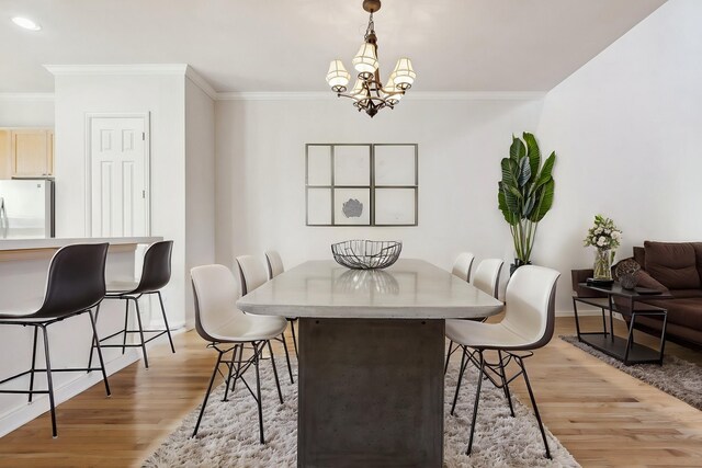 2028 N Haskell Ave, Dallas, TX 75204 - dining room with light wood-type flooring, ornamental molding, baseboards, a chandelier, and recessed lighting