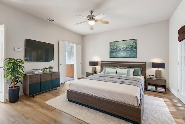 2028 N Haskell Ave, Dallas, TX 75204 - bedroom with light wood-style flooring, a ceiling fan, and ensuite bathroom