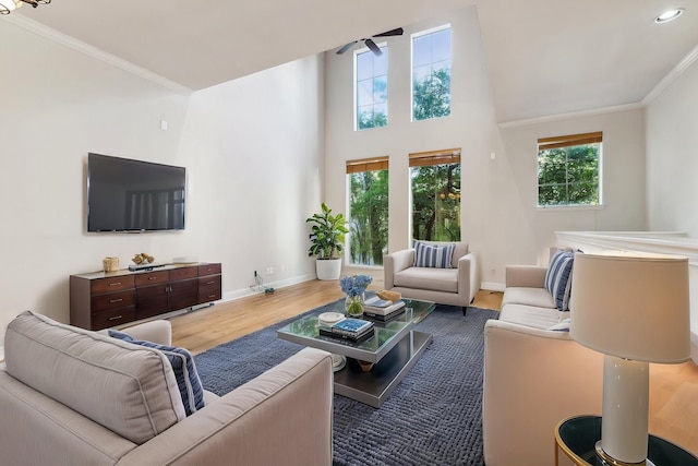 2028 N Haskell Ave, Dallas, TX 75204 - living room with wood finished floors, baseboards, ceiling fan, and crown molding