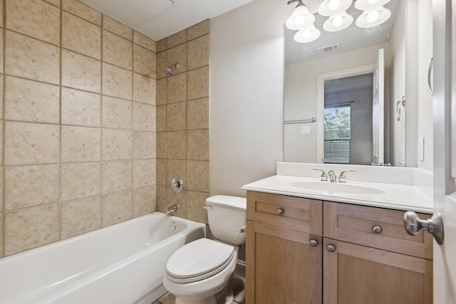 2028 N Haskell Ave, Dallas, TX 75204 - bathroom with toilet, vanity, bathtub / shower combination, a textured wall, and a chandelier