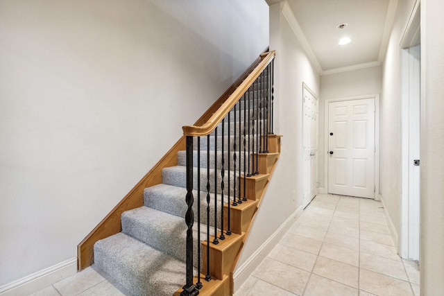 2028 N Haskell Ave, Dallas, TX 75204 - staircase featuring tile patterned flooring, crown molding, and baseboards