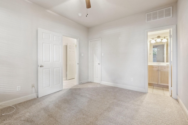 2028 N Haskell Ave, Dallas, TX 75204 - unfurnished bedroom with carpet, baseboards, and ensuite bathroom