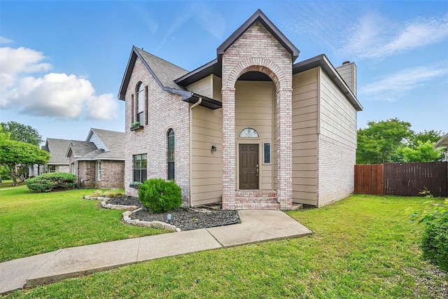 3211 Ruidoso Ln, Mckinney, TX 75070 - view of front of home featuring brick siding and a chimney