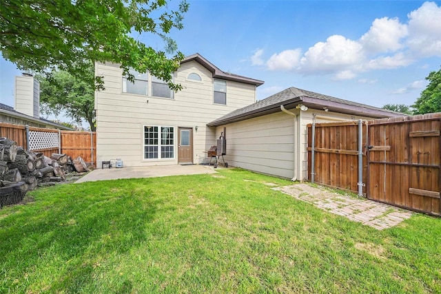 3211 Ruidoso Ln, Mckinney, TX 75070 - rear view of property with a patio area and a gate