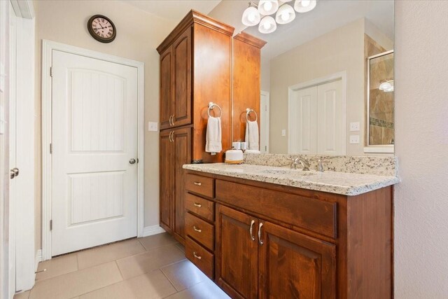 128 Creek Rdg, Waco, TX 76708 - full bathroom with tile patterned flooring, vanity, an enclosed shower, and a chandelier