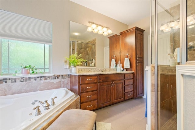 128 Creek Rdg, Waco, TX 76708 - bathroom featuring a stall shower, tile patterned flooring, a jetted tub, and vanity