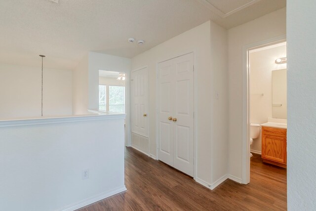 4617 Barnhill Ln, Fort Worth, TX 76135 - corridor with dark wood-style flooring and baseboards