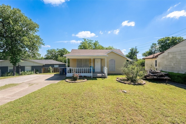 6058 Golden Gate Dr, Dallas, TX 75241 - view of front of property featuring a porch, driveway, and a front lawn