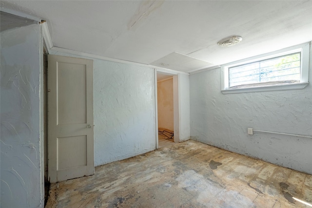 6058 Golden Gate Dr, Dallas, TX 75241 - spare room featuring a textured wall