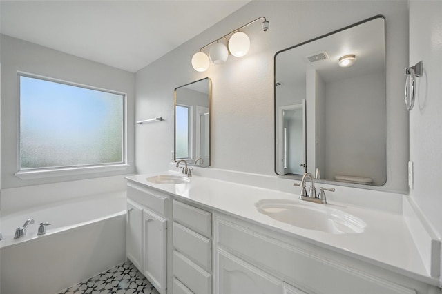 2668 Silver Hill Dr, Fort Worth, TX 76131 - full bathroom featuring a garden tub and double vanity
