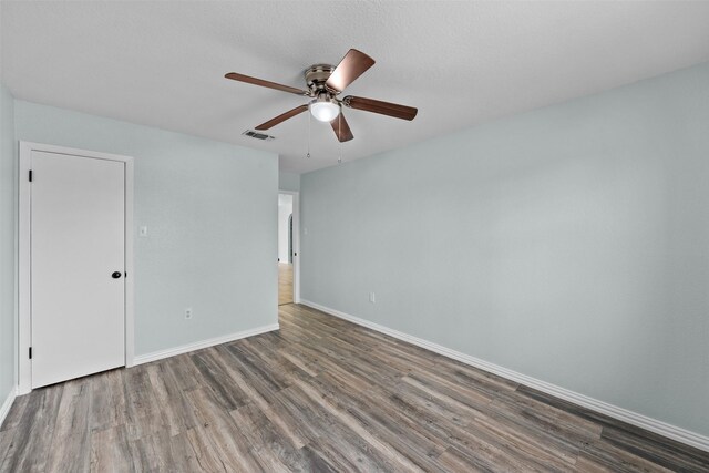 4306 Frog Dr, Killeen, TX 76542 - unfurnished room featuring wood finished floors, a ceiling fan, and baseboards