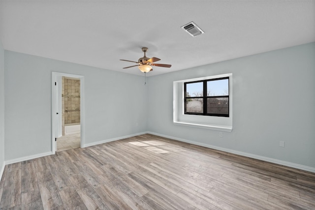 4306 Frog Dr, Killeen, TX 76542 - unfurnished room featuring ceiling fan, wood finished floors, and baseboards