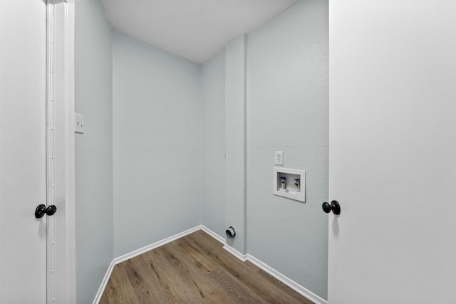 4306 Frog Dr, Killeen, TX 76542 - laundry area featuring washer hookup, wood finished floors, and baseboards