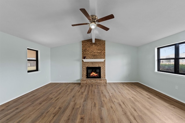 4306 Frog Dr, Killeen, TX 76542 - unfurnished living room with wood finished floors, a fireplace, ceiling fan, and baseboards
