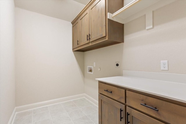 514 Geyser Trl, Waco, TX 76657 - laundry room with cabinet space, electric dryer hookup, hookup for a washing machine, baseboards, and hookup for a gas dryer