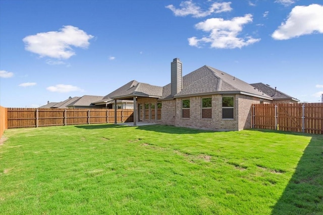 514 Geyser Trl, Waco, TX 76657 - back of house featuring brick siding, a shingled roof, and a chimney