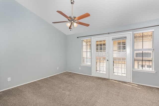 8750 Park Ln Unit 151, Dallas, TX 75231 - carpeted spare room with vaulted ceiling, french doors, ceiling fan, and baseboards