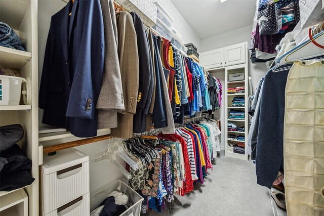 7904 Briar Brook Ct, Dallas, TX 75218 - walk in closet featuring carpet floors