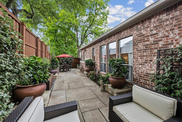 7904 Briar Brook Ct, Dallas, TX 75218 - view of patio featuring a fenced backyard and an outdoor hangout area