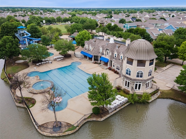 1632 Degnen Ln, Providence Village, TX 76227 - drone / aerial view of a nearby body of water and a pool area