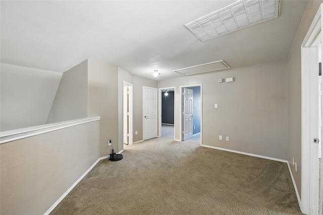 1632 Degnen Ln, Providence Village, TX 76227 - spare room with attic access, carpet floors, and baseboards